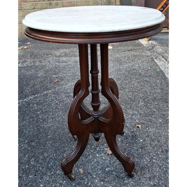 Victorian Late 19th Century Eastlake Style Walnut and Marble Tip Oval Rolling Side Table For Sale - Image 3 of 8