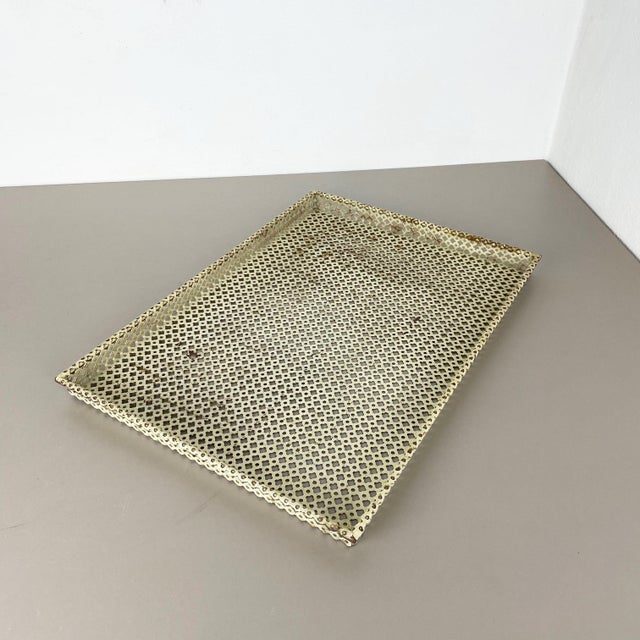 Metal tray. attributed to be Designed and produced by Mathieu Matégot. Origin: France, 1950s. Original Mathieu Matégot...