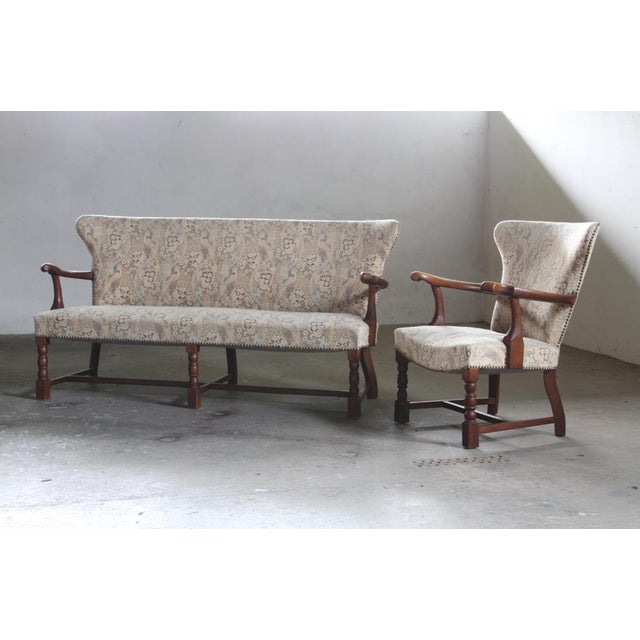 A beautiful Solid Oak Sofa from the 1940s featuring two spacious armchairs as an extra option to match. The coach was...