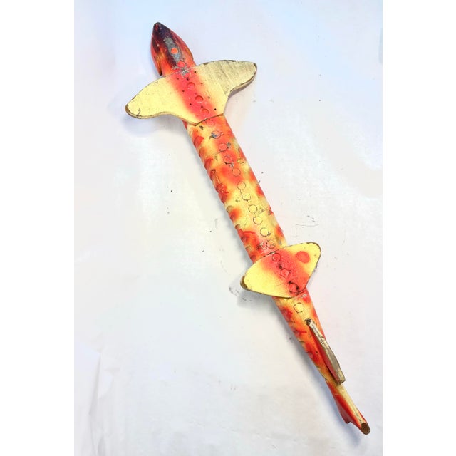 This is a large and in-charge ice fishing spearing decoy, and a striking example of practical American folk art. Carved...