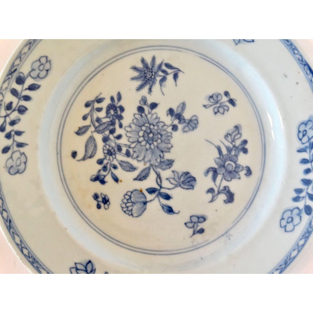 18th-Century English Delftware plate hand painted in the chinoiserie style. It is a lovely expressive aesthetic depiction...