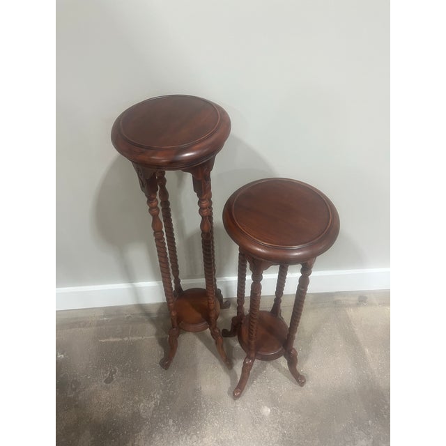 Exquisite pair of Vintage Victorianstyle mahogany barley twist legs plant stands. Hand crafted in very good vintage...