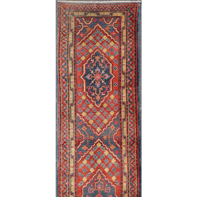 Traditional Antique Khotan Runner in Deep Indigo, Rust Red, and Soft Yellow Tones For Sale - Image 3 of 14