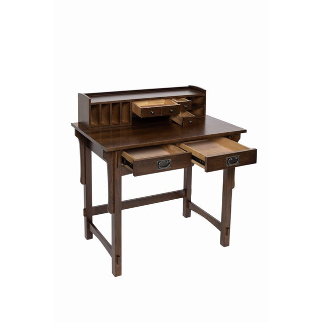 Solid oak and quarter sawn oak Walnut stain Mortise and Tenon Joinery 2 drawers Metal glides on drawers with dovetail...