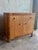 A refined vintage bedside chest by Bielecky Brothers, known for their high-quality rattan furniture and timeless Palm...
