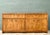 This vintage campaign credenza pairs warm walnut with crisp brass hardware, a combination that blends the clean,...