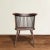 A lovable 19th century English barrelback Windsor arm chair with a graceful rounded crest-rail supported by several...