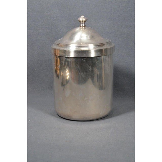 Elegant vintage silver-plated ice bucket by Christofle, from the Christofle Hotel line, France. This piece has the refined...
