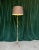 This elegant French Art Nouveau style floor lamp features an elaborate tripod base, adding a touch of sophistication to...