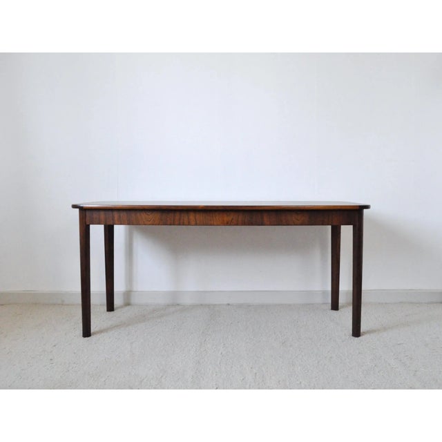 Danish Rosewood veneer and solid side table, excellent craftsmanship with beautiful details. Very good vintage condition,...