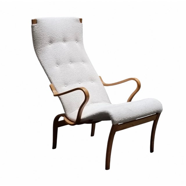 Rare and elegant Pernilla armchair designed by Bruno Mathsson in the 1940s and produced by Mathsson International. The...