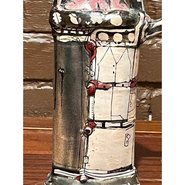 This authentic studio art pottery vessel by California ceramicist Gerry Wallace (BA/MA Fine Art, UC Berkeley) features a...
