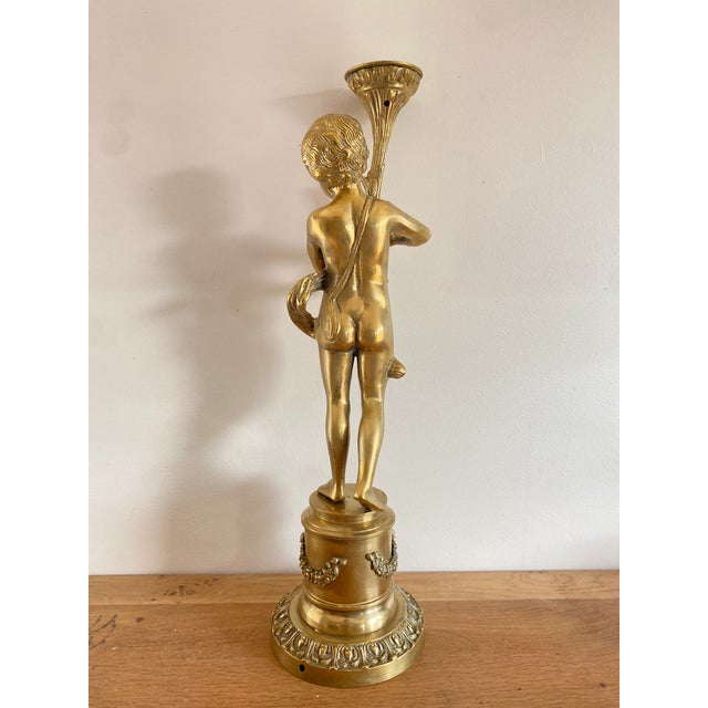 Putti with Torch, Late 19th Century, Gilt Bronze, in Flawless conditions. Designed before 1890
