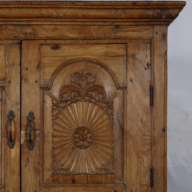Antique Indian Carved Teakwood/Fruitwood Armoire, of the very highest quality. The style resembles a baroque period buffet...