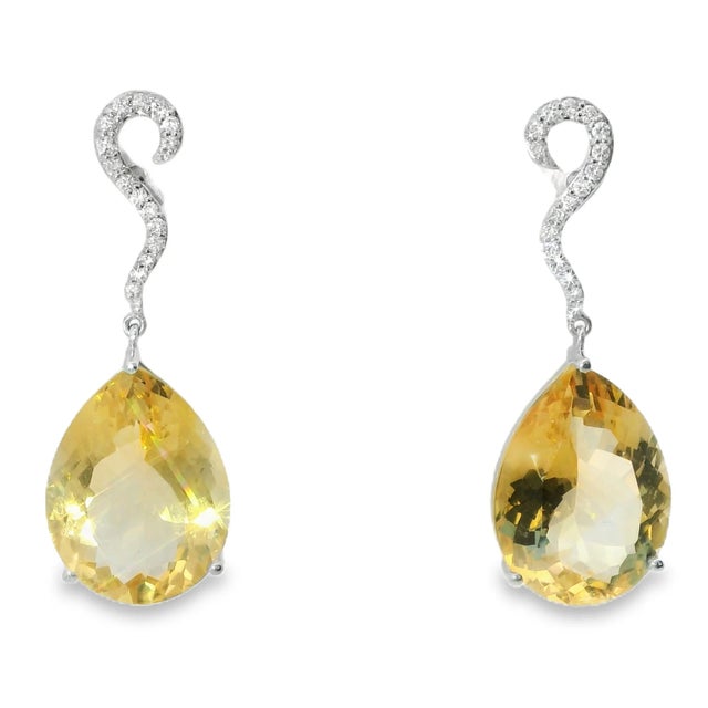 18K White Gold Citrine & Diamond Hanging Drop Earrings Stunning 18K white gold hanging earrings featuring 2 pear-shaped...