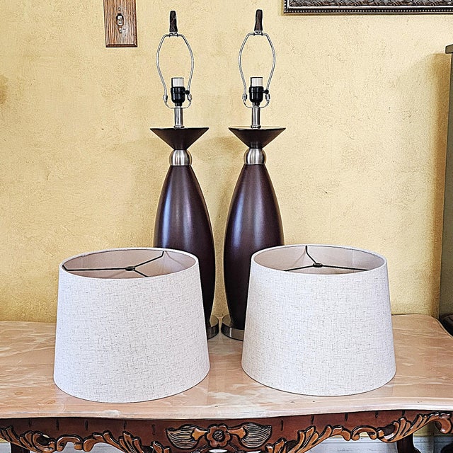 Pair of Contemporary Espresso Wood Hourglass Lamps With Brushed Nickel Accents and Linen Shades For Sale - Image 9 of 18