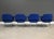 A set of four mid century modern blue office desk chairs or executive dining chairs designed by Eero Saarinen for Knoll....