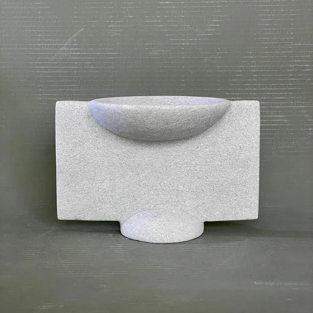 Hand carved marble vessel by tom von kaenel materials: marble dimensions: w13 x d24 x h18 cm this piece is attributed to...