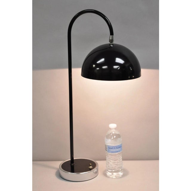 Vintage Mid Century Modern Black Arc Chrome Metal Table Desk Lamp. Circa Late 20th Century. Measurements: 25" H x 12 W x...