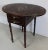Beautiful Leaf Table of Exceptional Quality with an Oblong top with two folding leaves decorated with inlays. Golden...