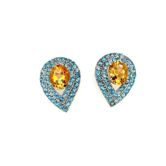 These elegant 13.06 carat pear-shaped citrine and blue topaz stud earrings are crafted in 925 sterling silver, featuring...