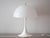 The Panthella desk lamp was designed in 1971 by Verner Panton for Louis Poulsen and is one of the icons of Danish design....