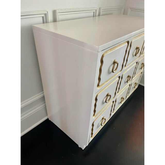 Offered is a vintage chest of drawers in the iconic style of Dorothy Draper Espana. This solid wood piece features three...