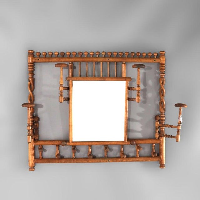 Antique Oak Stick & Ball Hat Rack with Mirror C1920 Measures - 26.75"H x 31"W x 8.5"D This elegant antique hat rack,...