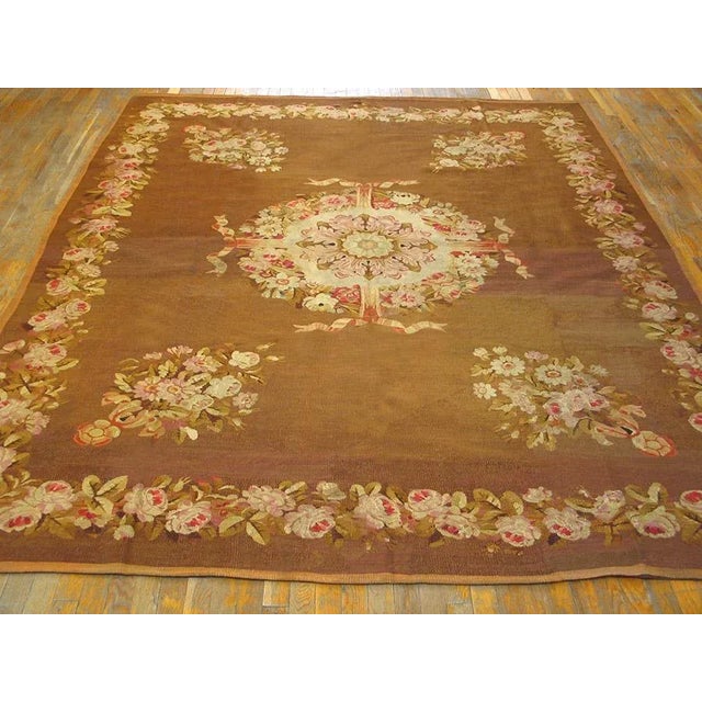Early 19th Century French Empire Aubusson Carpet ( 8' x 9'3" - 245 x 282 ) This c.1830 French carpet is the exception that...