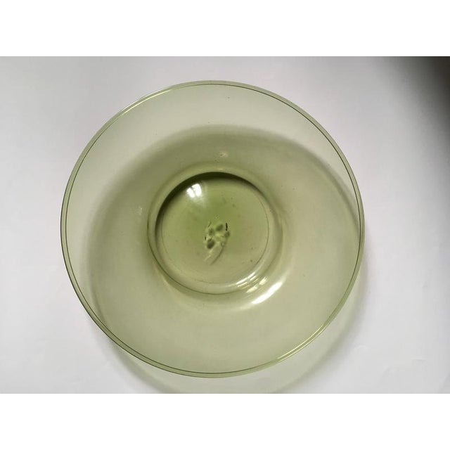 This elegant Venetian item is a green blown glass totally hand made in 1960 circa by the master Murano craftmenships. It...