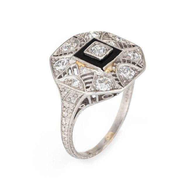 Elegant & finely detailed Art Deco era ring (circa 1920s to 1930s) crafted in 900 platinum. Old mine and single cut...