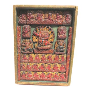 Tibetan Votive Panel of Polychromed Carved Wood. For Sale