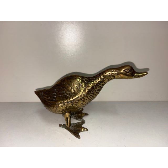 Vintage solid brass duck figurine, featuring embossed plumage and stable webbed feet, 1960s and 1970s, height 12.5 cm,...