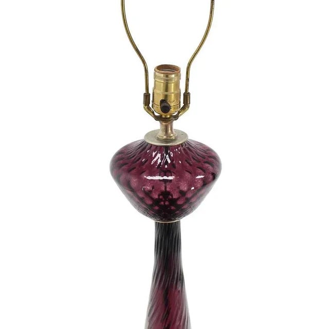 Rare Mid-Century Modern tall tower shape cranberry and brass table lamp.