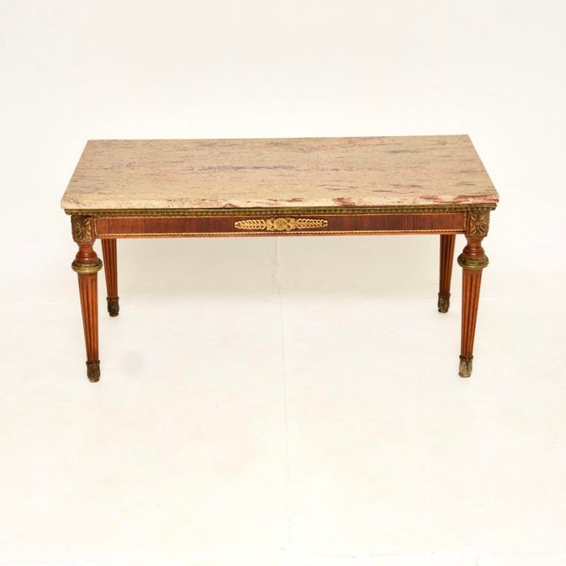 A beautiful and extremely well made antique French marble top coffee table, dating from around the 1930’s. This is of...
