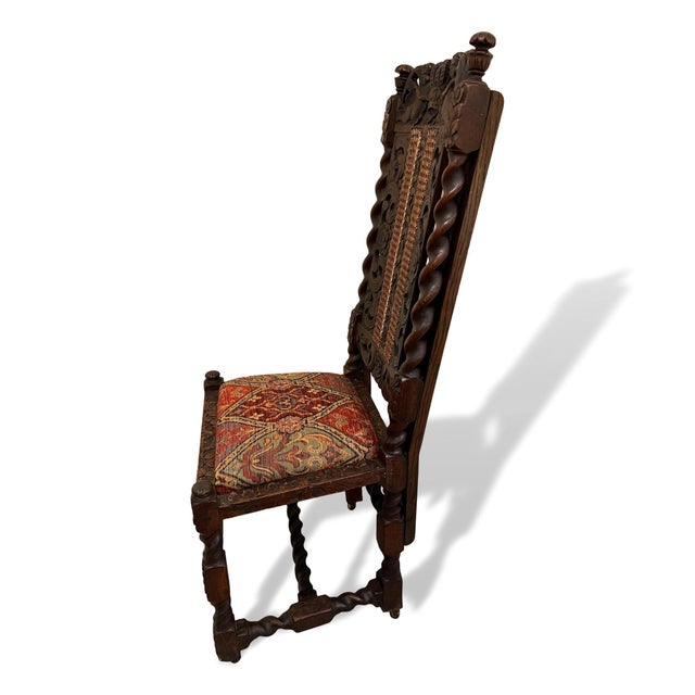 Pair of Late 18th Century Renaissance Revival wooden chairs. The chairs feature hand carved barley twist frames and...