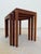 This elegant set of three nesting tables from denmark combines the functional matryoshka principle with the striking...