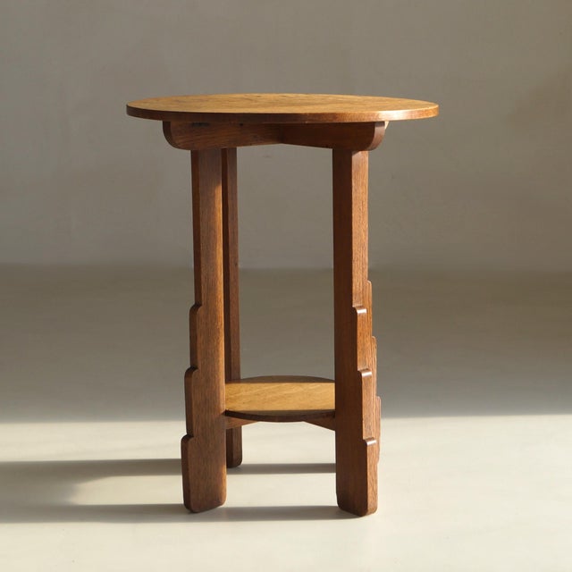 A sculptural Amsterdam School side table with a geometry that's pleasing to the eye. Design, craftsmanship and warmth meet...