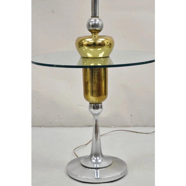 Vintage 1970s Mid Century Modern Space Age Atomic Era Chrome Brass and Glass Side Table Floor Lamp. Circa Mid 20th...