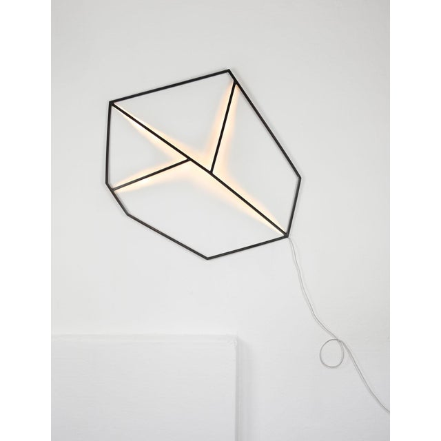 - Feather light designer wall lamp made of plastic profiles - Warm white LED light - Packed with love and care - EU plug...