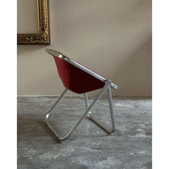 Plona folding armchair designed by Giancarlo Piretti in 1969 and produced by Anonima Castelli around the 1970s. Foldable...