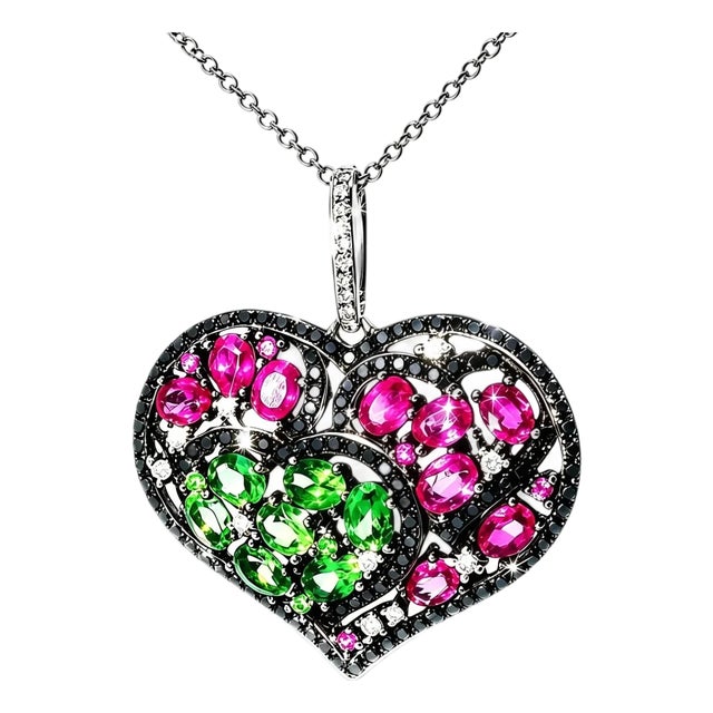 Late 20th Century 18K Black White Gold Diamond with Red Green Sapphires Heart Pendant For Sale