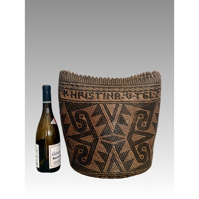 The feel of this piece is amazing - soft and supple, smooth and very tactile. A finely hand woven basket.or backpack /...