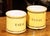 Pair of yellow glazed ceramic "Tabac" jars; French, circa 1880.