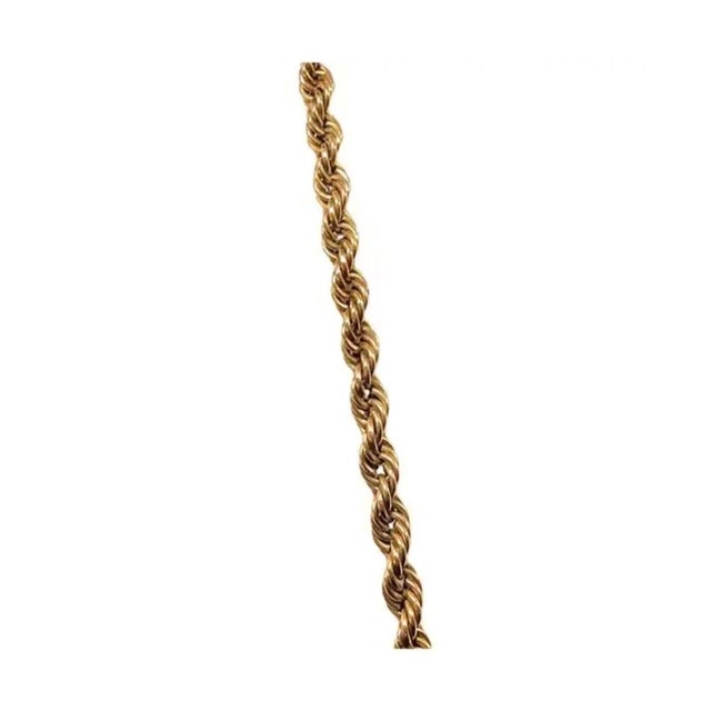 14k Yellow Gold Twisted Rope necklace. Secure clasp. Approximately 18 grams TW. Approximately 26 inches in length. Marked...
