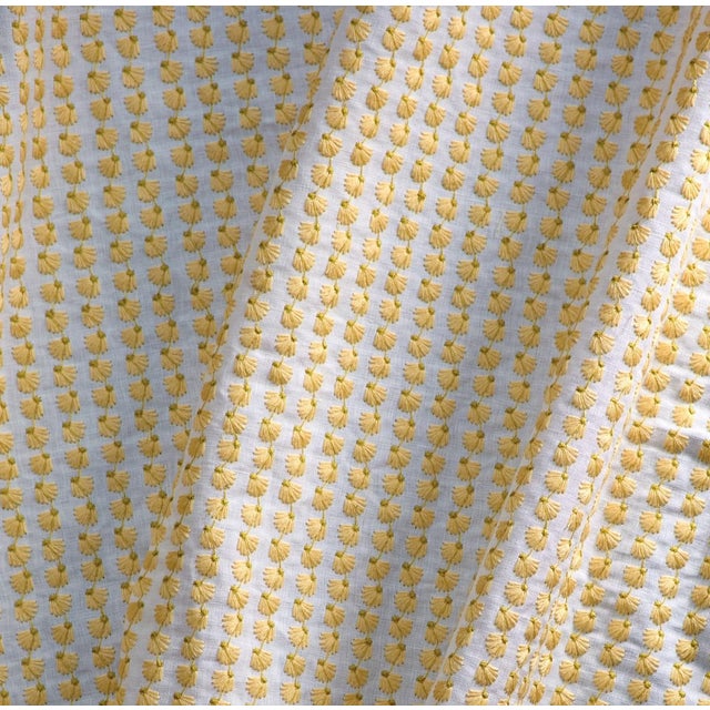 This flowering embroidery evokes the illusion of a whimsical daisy chain. Small in scale with a raised texture in the...