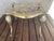 Vintage Home is pleased to present this 1800s Antique Kettle Stand. The English cast brass stand features two birds...