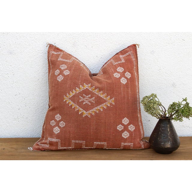 Woven from the resilient fibers of the Saharan aloe vera cactus — often called cactus silk or Sabra silk — this large...