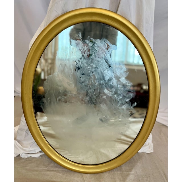 This siimple oval mirror is absolute elegance. It is solid wood, well constructed, sturdy and heavy. Given that the mirror...