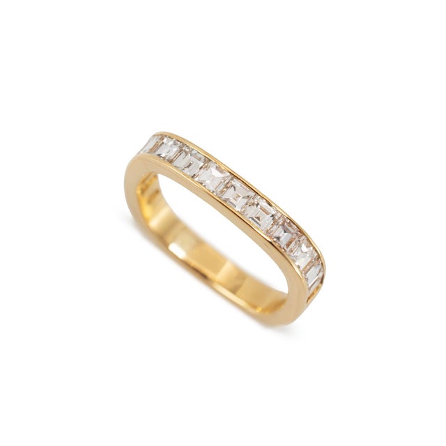 Gender: Ladies Metal Type: 18K Yellow Gold Ring Size: 5 Width: 3.00 mm Weight: 3.66 grams Ladies 18K yellow gold diamond...